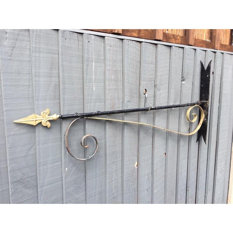 Quirky metal arrow sign pub restaurant advertising direction house name
