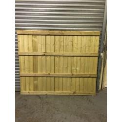 Pressure treated flat top feather edge fence panels