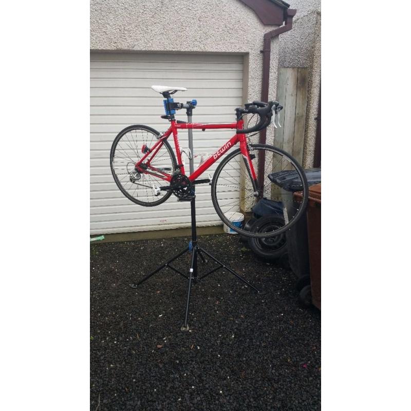 Stand for holding bike