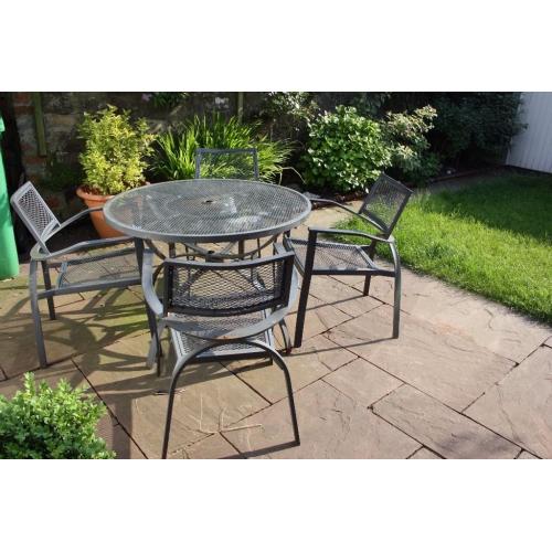 Sturdy set of 4 patio chairs and table.