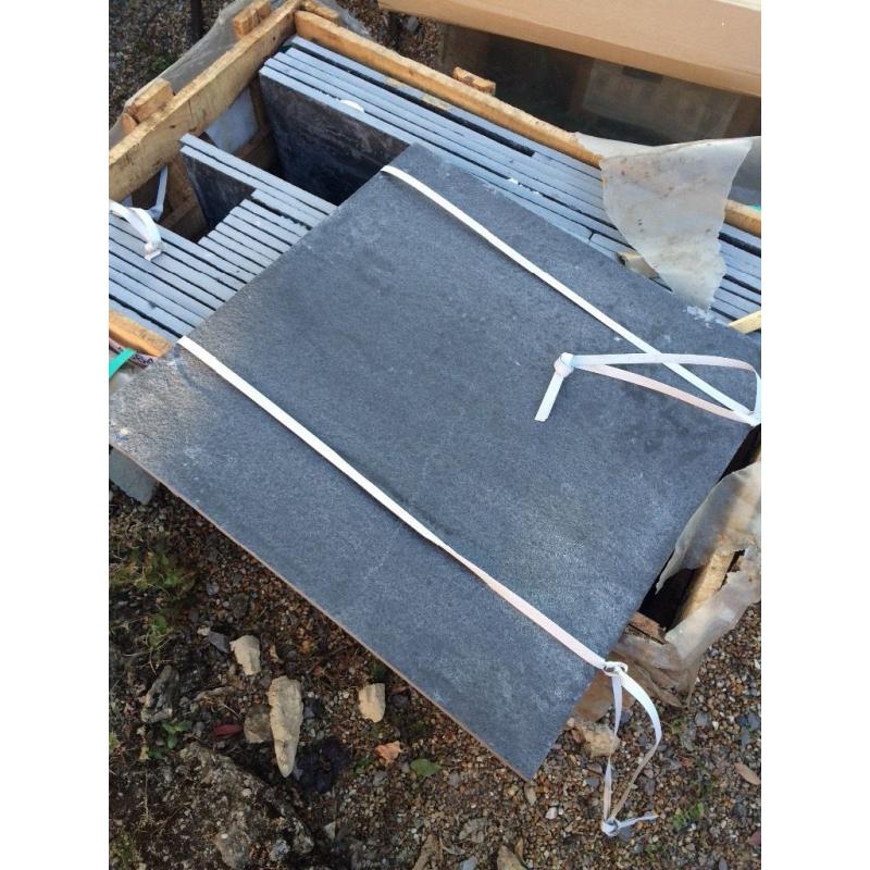 Mixed size paving slabs