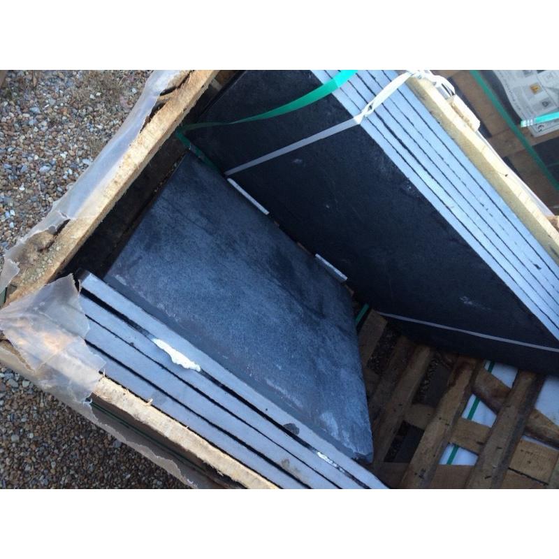 Mixed size paving slabs