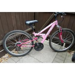 Girls 12.5" mountain bike with full suspension and grip shift gears