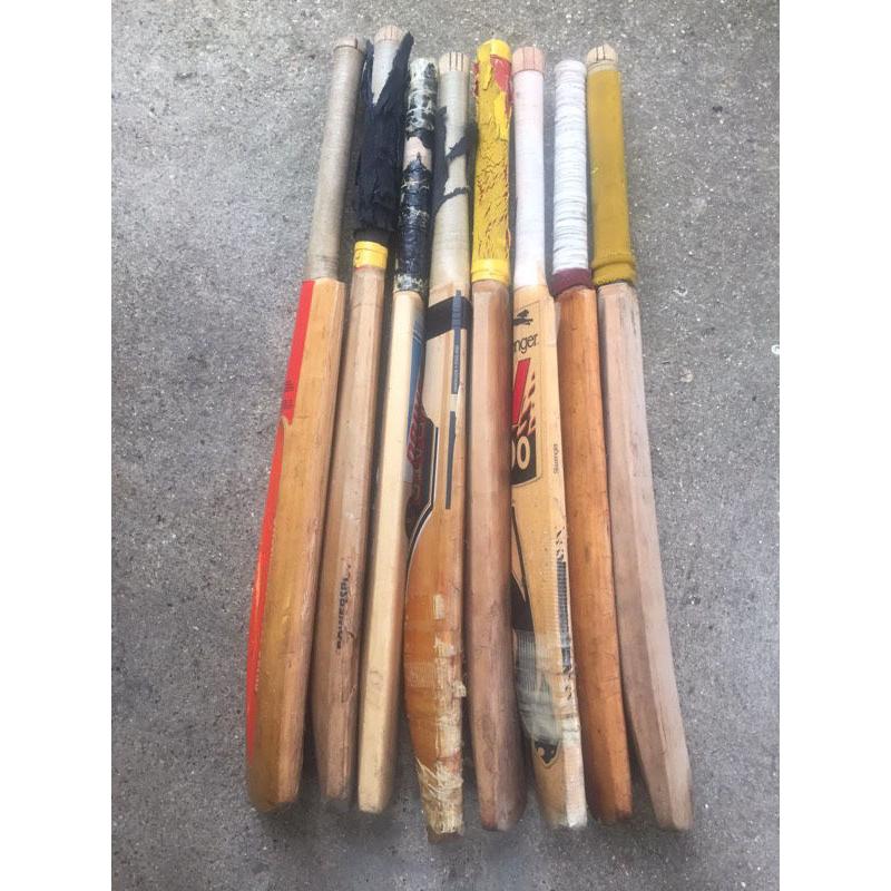 Collection of 8 well used Cricket bats for sale, and two pairs of cricket gloves