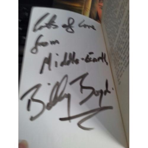 Lord of the Rings official movie guide and Signed two towers paperback