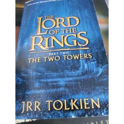 Lord of the Rings official movie guide and Signed two towers paperback
