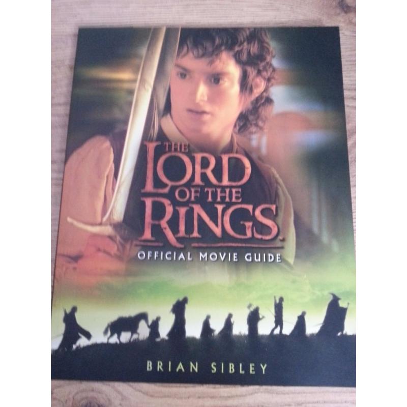 Lord of the Rings official movie guide and Signed two towers paperback