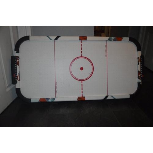 Kids air hockey table