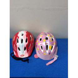 2 kids' bike helmets