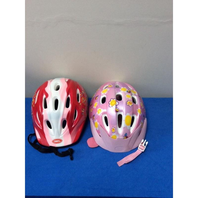 2 kids' bike helmets