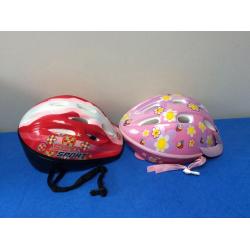 2 kids' bike helmets