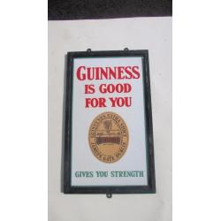 Antique Guinness pub sign.
