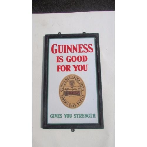 Antique Guinness pub sign.
