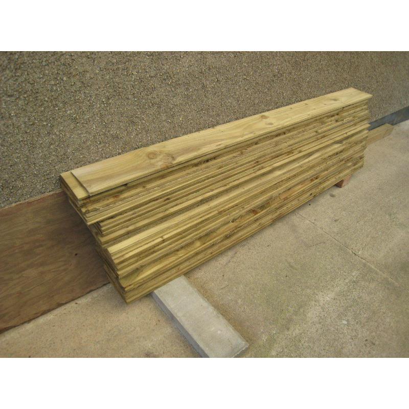 Feather edged fencing.