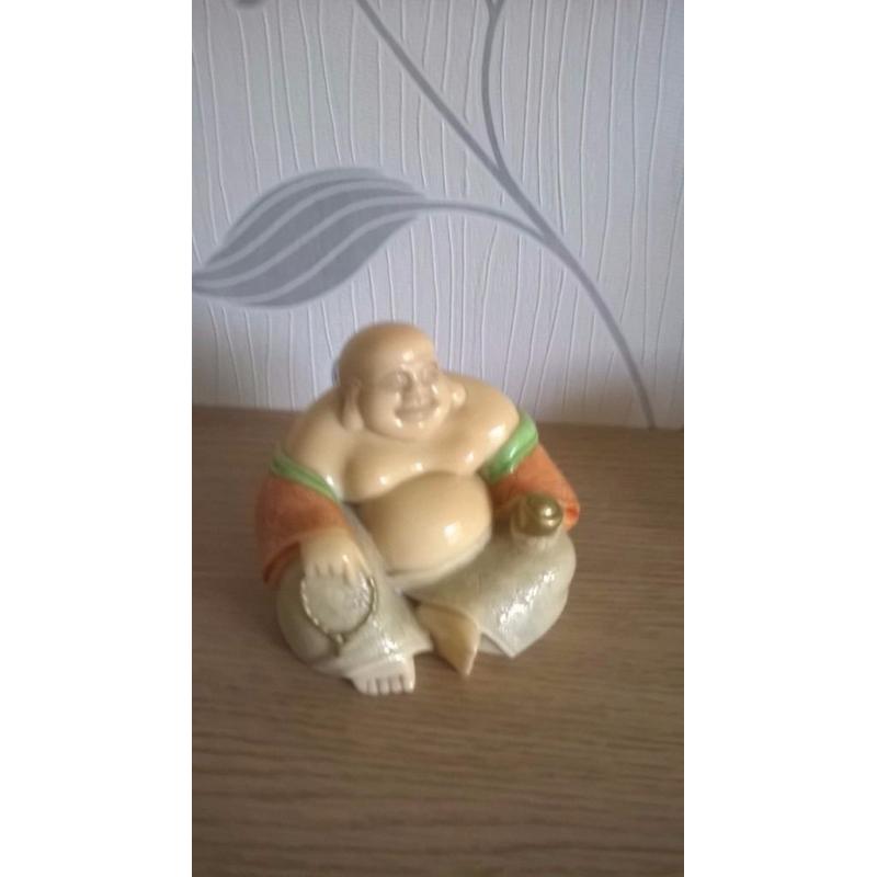 2 Porcelain Bhuddas for sale. P.U.O.
