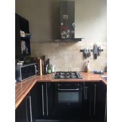 Black gloss kitchen units & appliances