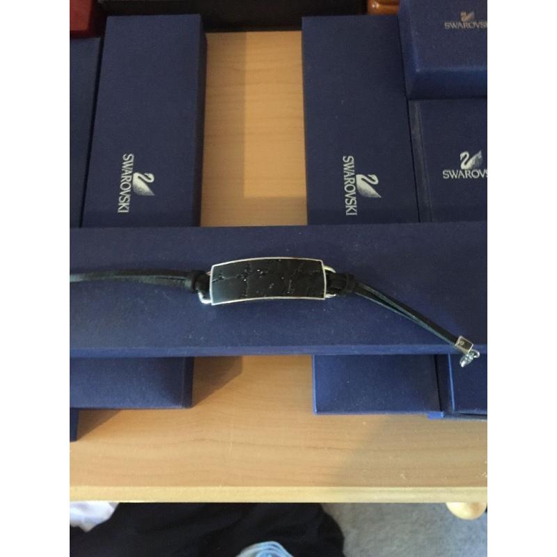 Black Swarovski bracelet. In original box.