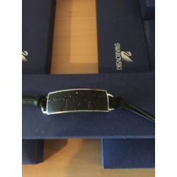 Black Swarovski bracelet. In original box.