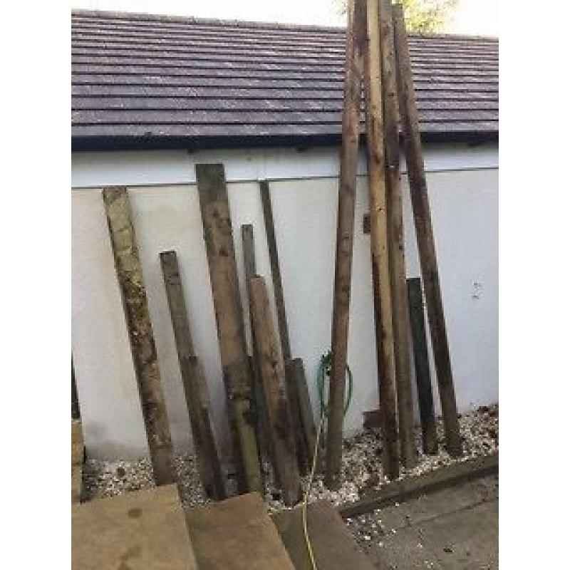 mix of wooden posts/boards etc, for recycling project etc. fence posts.