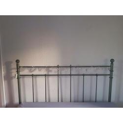 Grey metal double bed.