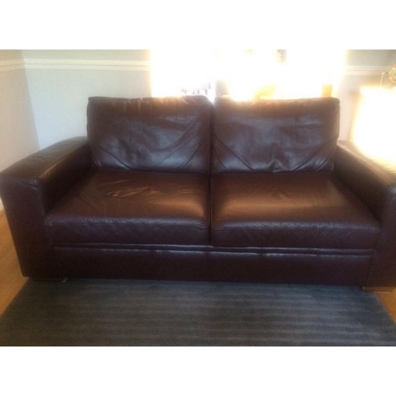 Large leather sofa bed for sale chestnut colour,comfy good condition
