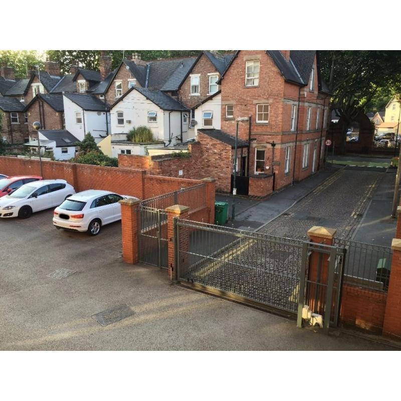 Secure car park space near the city centre, accessible with buzzer