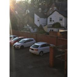 Secure car park space near the city centre, accessible with buzzer