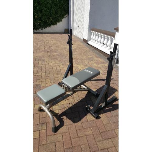 Weight training bench and stands for barbell.
