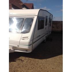 Sterling Europa 500L 1999 5 berth with 2 full awing wheel clamp