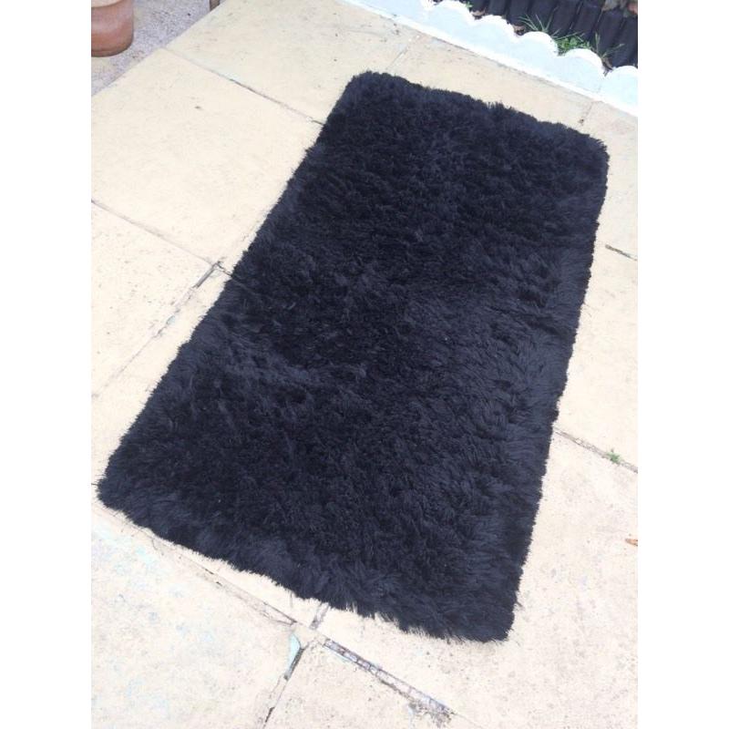 Black shaggy rug