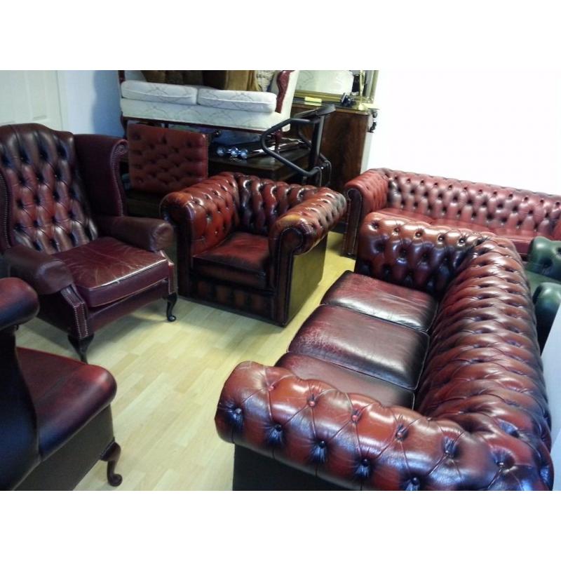 Lovely set ox blood leather chesterfield 3 setter high back chair and club chair.