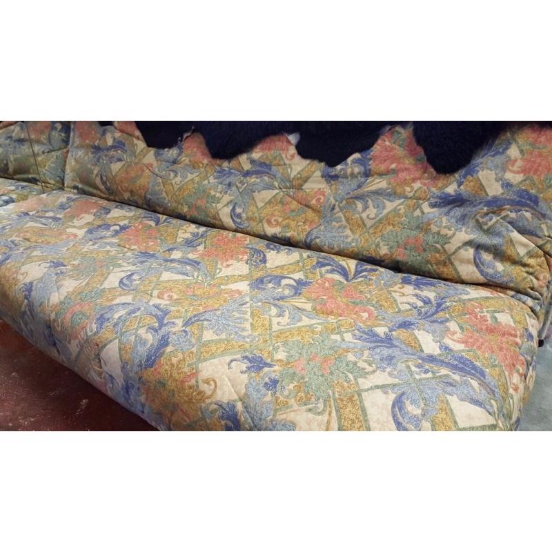 Cream and Green Floral Fabric Sofa Bed with Black Fur Rug in Excellent Condition