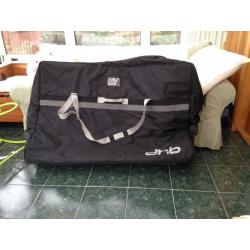 DHB soft padded bike bag with wheels on one corner for ease.