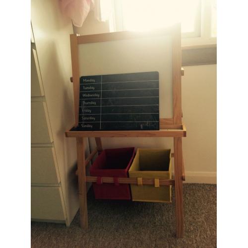 Easel with under storage baskets