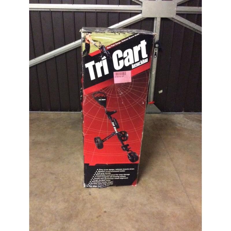 Golf trolley. Still boxed "NEW"