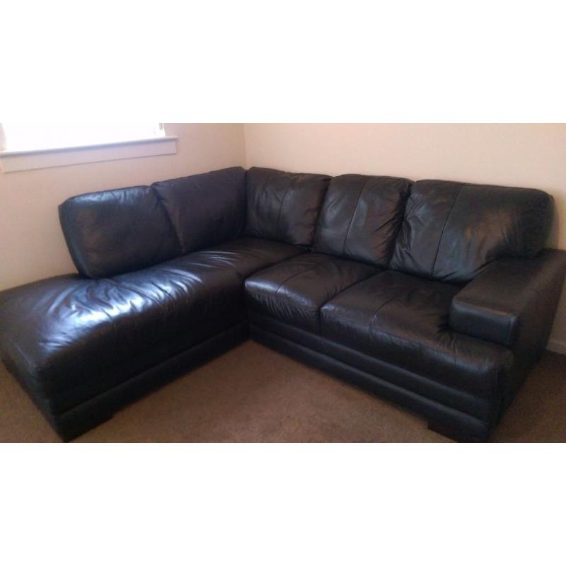 Immaculate leather corner sofa