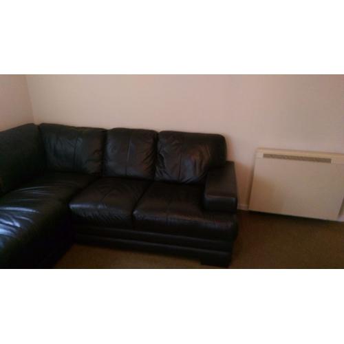 Immaculate leather corner sofa