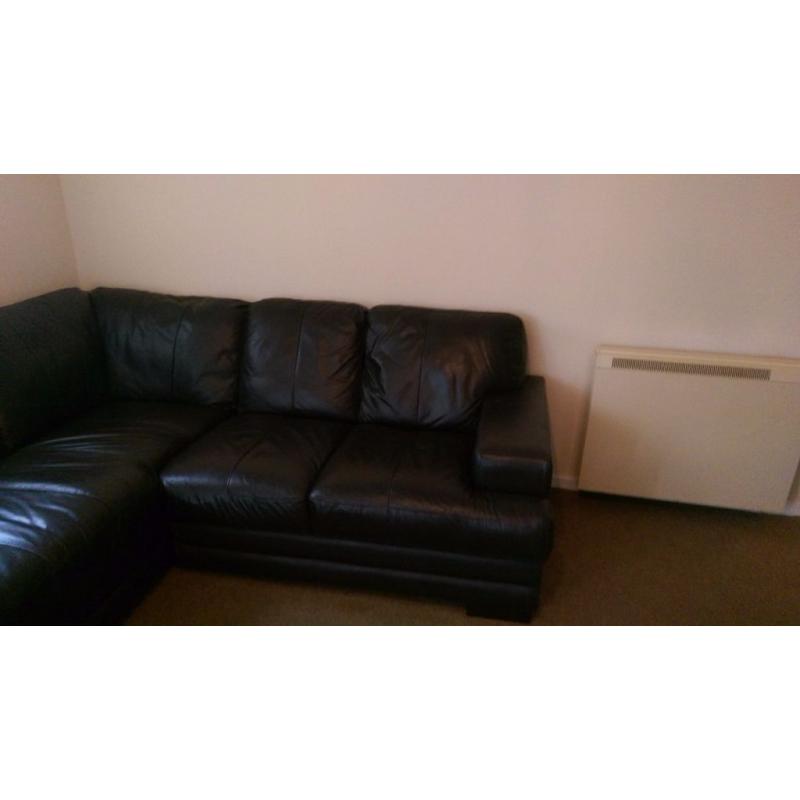 Immaculate leather corner sofa