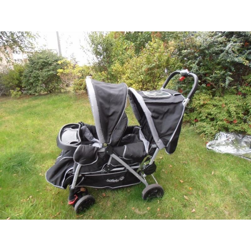 Tandem buggy complete with liners/covers raincover shopping tray. Fully foldable