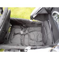 Tandem buggy complete with liners/covers raincover shopping tray. Fully foldable