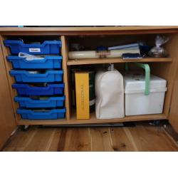 Mobile storage cupboard with 2 x doors, shelves and trays