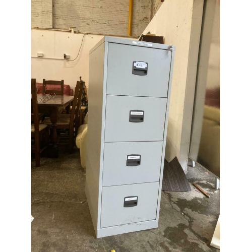 Four drawer metal filing cabinet with key
