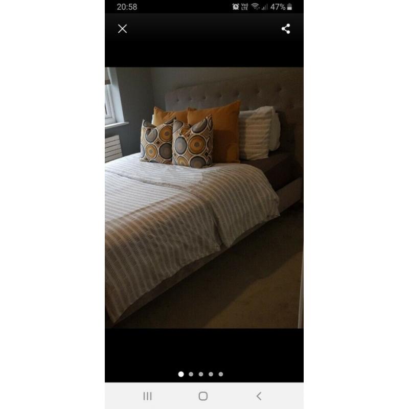 Upholstered grey kingsize bed frame