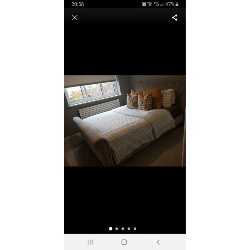 Upholstered grey kingsize bed frame