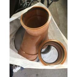 Bag full of sewage pipe connectors