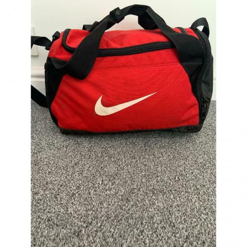 Nike red duffle/kit bag