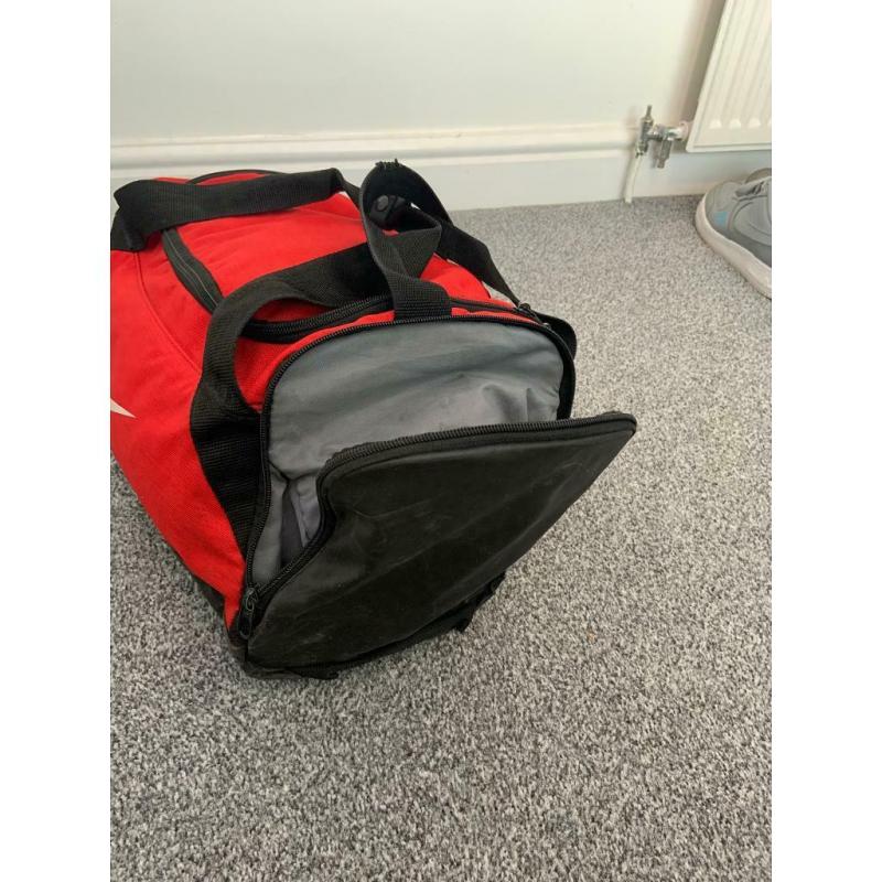Nike red duffle/kit bag
