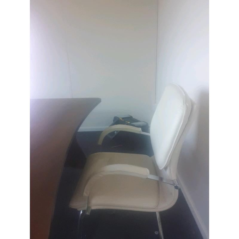 Cream leather executive office chairs