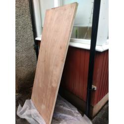 Solid wood storm door.