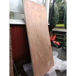 Solid wood storm door.